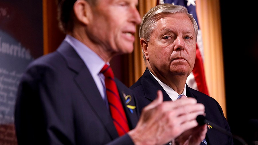 Sen. Lindsey Graham (R-S.C.) and Sen. Richard Blumenthal (D-Conn.) speak to reporters on designating Russia as a state sponsor of terrorism during a press conference in the U.S. Capitol on Tuesday, May 10, 2022.