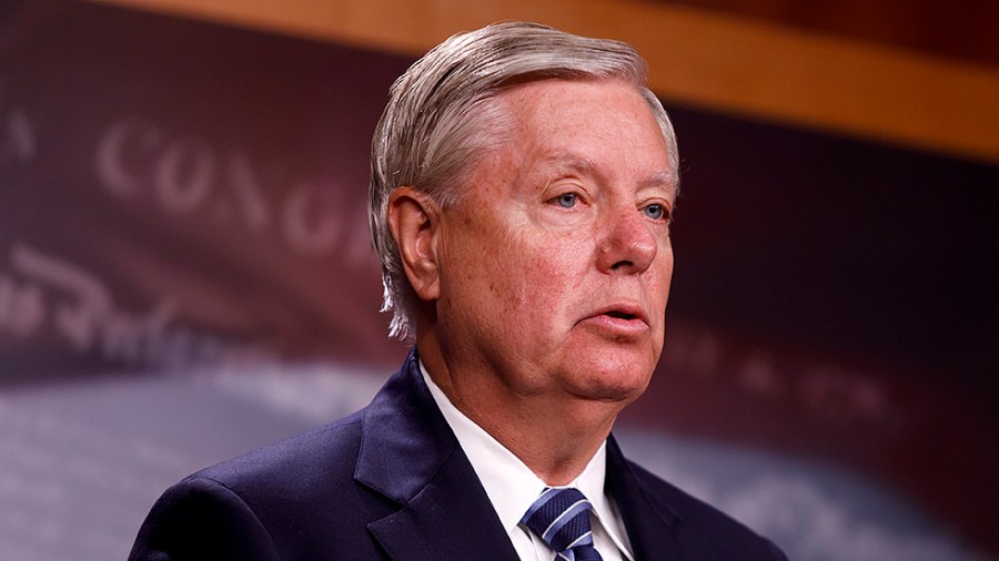 Sen. Lindsey Graham (R-S.C.) and Sen. Richard Blumenthal (D-Conn.) speak to reporters on designating Russia as a state sponsor of terrorism during a press conference in the U.S. Capitol on Tuesday, May 10, 2022.