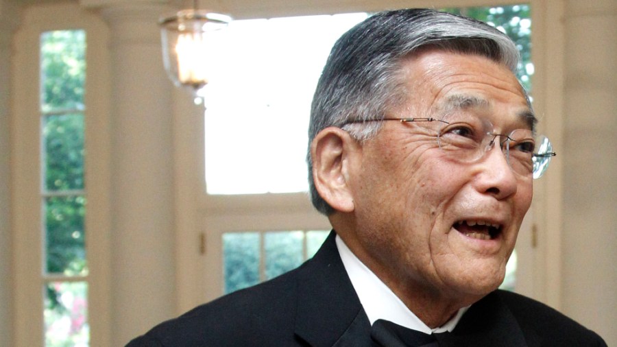 Former Transportation Secretary Norman Mineta, and his wife Deni arrive for a State Dinner at the White House in 2011