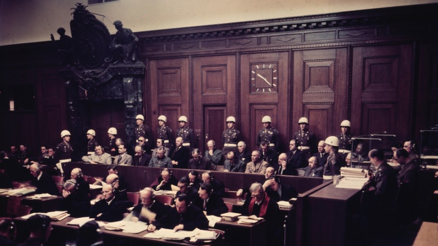 Defenders hear parts of the verdict in the Palace of Justice at the Nuremberg War Crimes Trial in Germany on Sept. 30, 1946