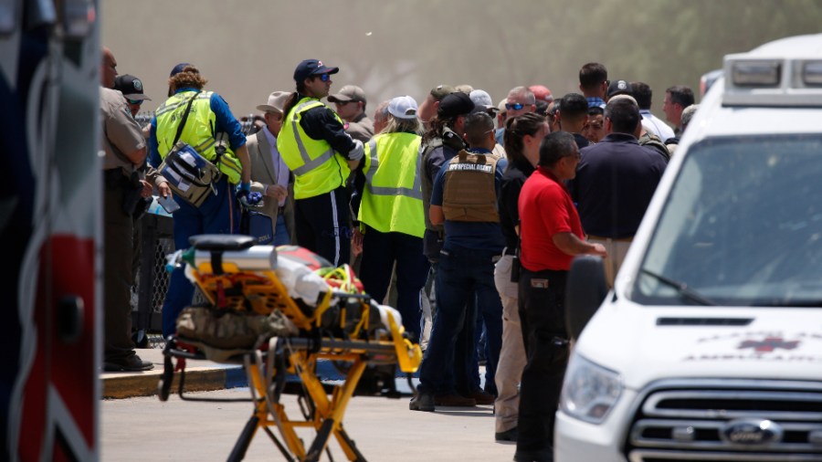 Emergency personnel gather near Robb Elementary School in Uvalde, Texas.