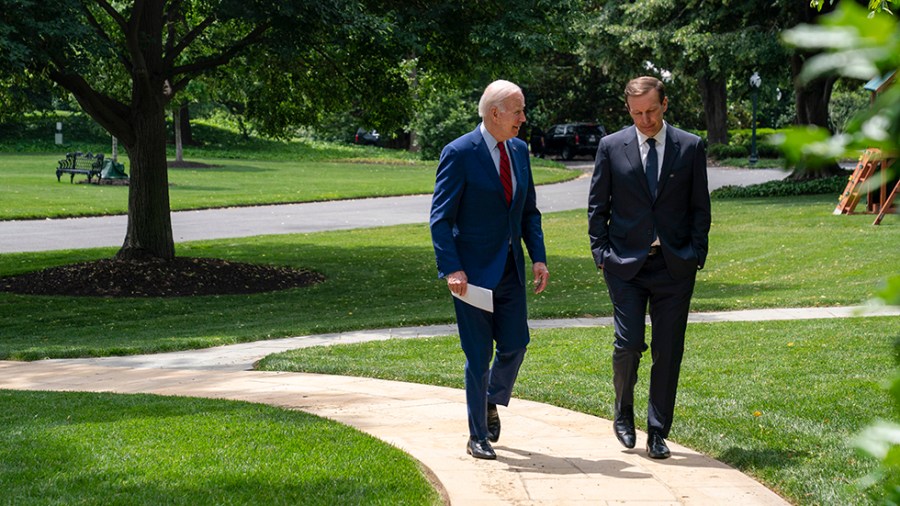 President Biden talks with Sen. Chris Murphy (D-Conn.)