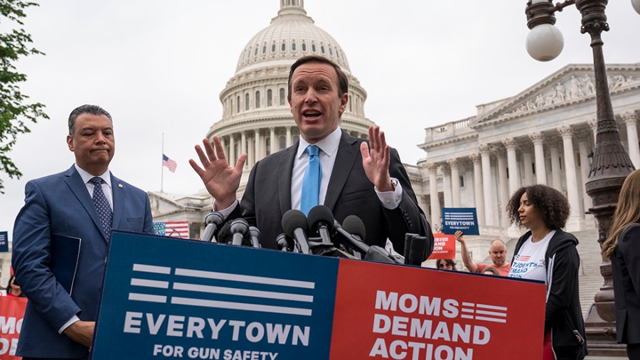 Sen. Chris Murphy (D-Conn.) and Sen. Alex Padilla D-Calif.) speak to activists