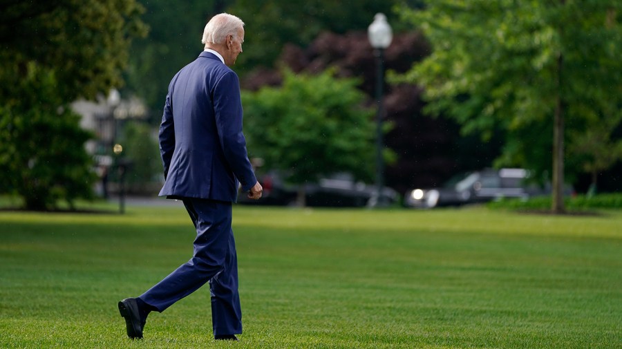 President Biden walks on the South Lawn of the White House