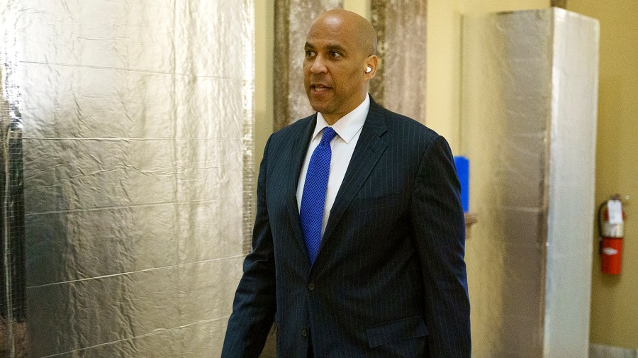 Sen. Cory Booker (D-N.J.) arrives for the weekly Senate Democratic policy luncheon on Tuesday, June 14, 2022.