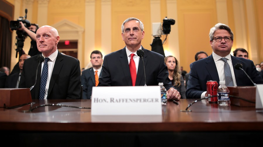 Arizona House Speaker Rusty Bowers (R), Georgia Secretary of State Brad Raffensperger and Georgia Secretary of State Chief Operating Officer Gabriel Sterling arrive for a House Jan. 6 committee hearing on Tuesday, June 21, 2022.