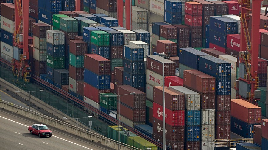 Shipping containers are seen in Hong Kong