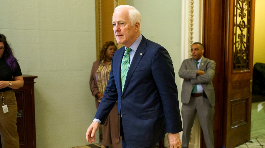 Sen. John Cornyn (R-Texas) leaves the Senate Chamber after giving a floor speech to update on bipartisan negations and legislative writing on a gun reform package on Tuesday, June 21, 2022.