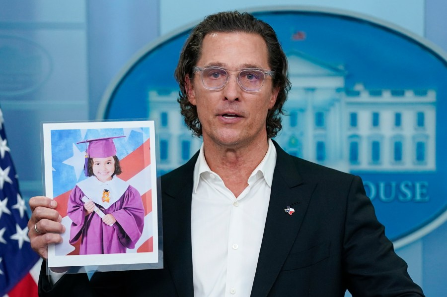 Actor Matthew McConaughey holds a picture or Alithia Ramirez, 10, who was killed in the mass shooting at an elementary school in Uvalde, Texas, as he speaks during a press briefing at the White House, Tuesday, June 7, 2022, in Washington.