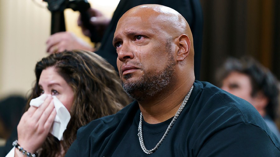 Sandra Garza, former partner of fallen U.S. Capitol Police Officer Brian Sicknick, and U.S. Capitol Police Officer Harry Dunn get emotional while watching video footage during a Jan. 6 House Select Committee hearing to show unseen video footage and taped depositions after a year-long investigation on Thursday, June 9, 2022.