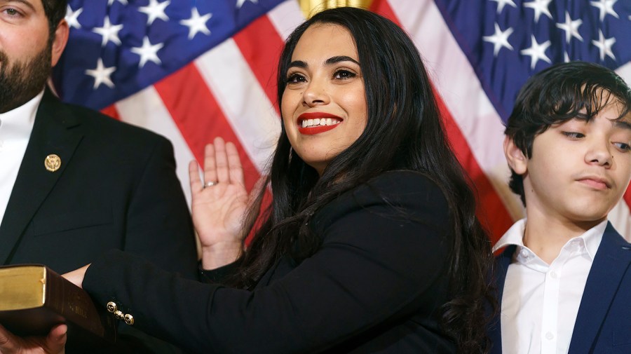 Rep. Mayra Flores (R-Texas) participates in a ceremonial swearing in for members of the press after being sworn in on Tuesday, June 21, 2022. She’s the first Mexican-born member to serve in the House.