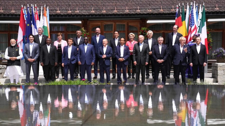 Group of Seven leaders and Outreach guests pose for a group photo during the G7 summit at Castle Elmau in Kruen