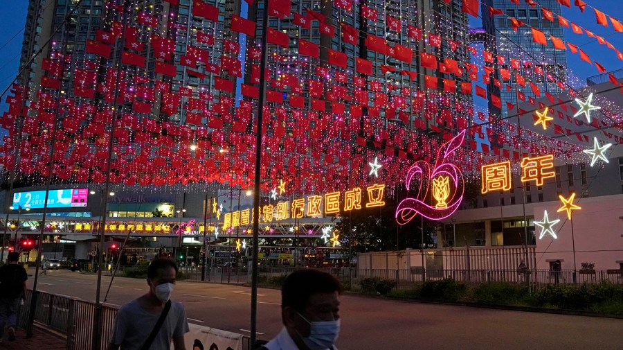 Light installations with Chinese and Hong Kong flags are displayed to celebrate the 25th anniversary of Hong Kong handover to China.