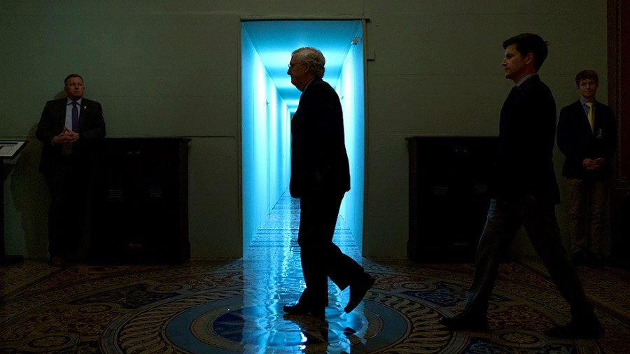 Minority Leader Mitch McConnell (R-Ky.) returns to his office after opening up the Senate on Monday, June 6, 2022.