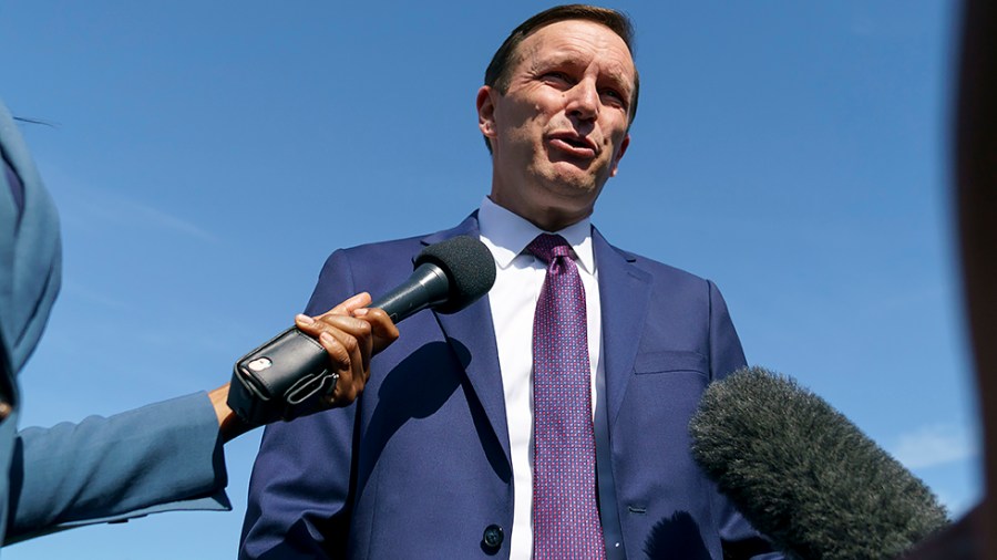 Sen. Chris Murphy (D-Conn.) addresses reporters during a rally hosted by gun reform groups outside the Capitol on Monday, June 6, 2022 as the Senate returns from a district work period after multiple mass shootings.