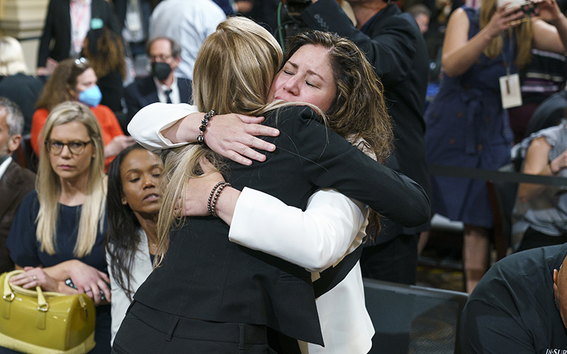 U.S. Capitol Police Officer Caroline Edwards hugs Sandra Garza