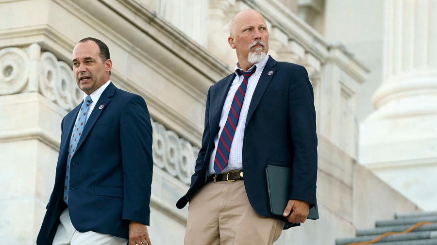 Reps. Bob Good (R-Va.) and Chip Roy (R-Texas) leave the House Chamber following the last votes of the day on Tuesday, June 21, 2022.