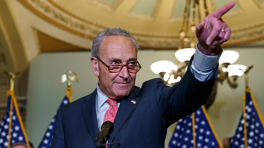 Majority Leader Charles Schumer (D-N.Y.) points to a reporter for a question following the weekly policy luncheon on Tuesday, June 7, 2022.