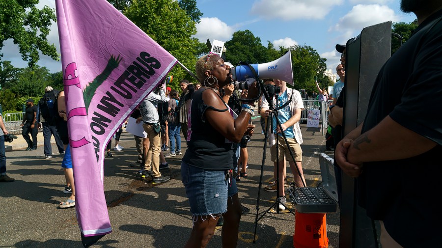 Protesters for and against abortion rights demonstrate outside the Supreme Court on Friday, June 24, 2022 in anticipation of an opinion that could strike Roe v. Wade.