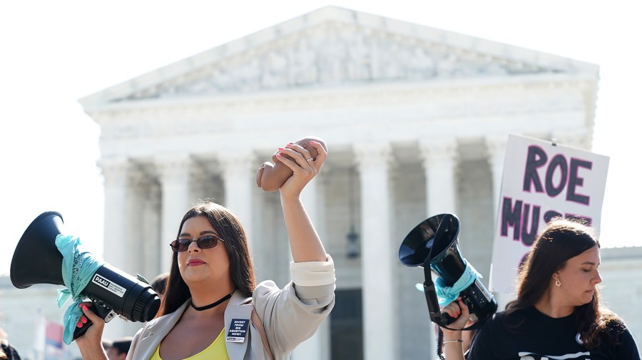 Supporters who oppose abortion demonstrate outside the Supreme Court on Wednesday, June 15, 2022 as the Court is set to release several opinions.