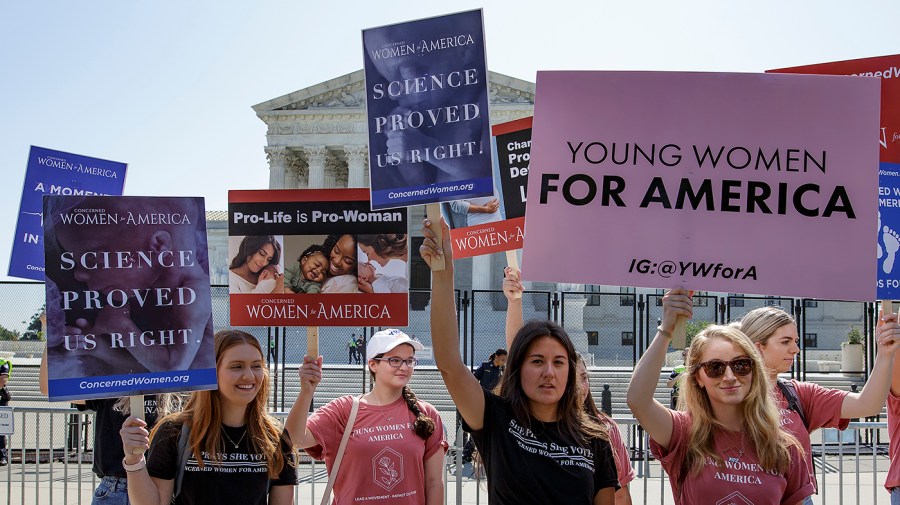 Protesters against abortion demonstrate in front of the Supreme Court on Wednesday, June 15, 2022.