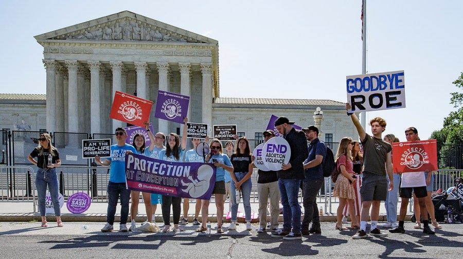 Protesters against abortion demonstrate in front of the Supreme Court on Wednesday, June 15, 2022.