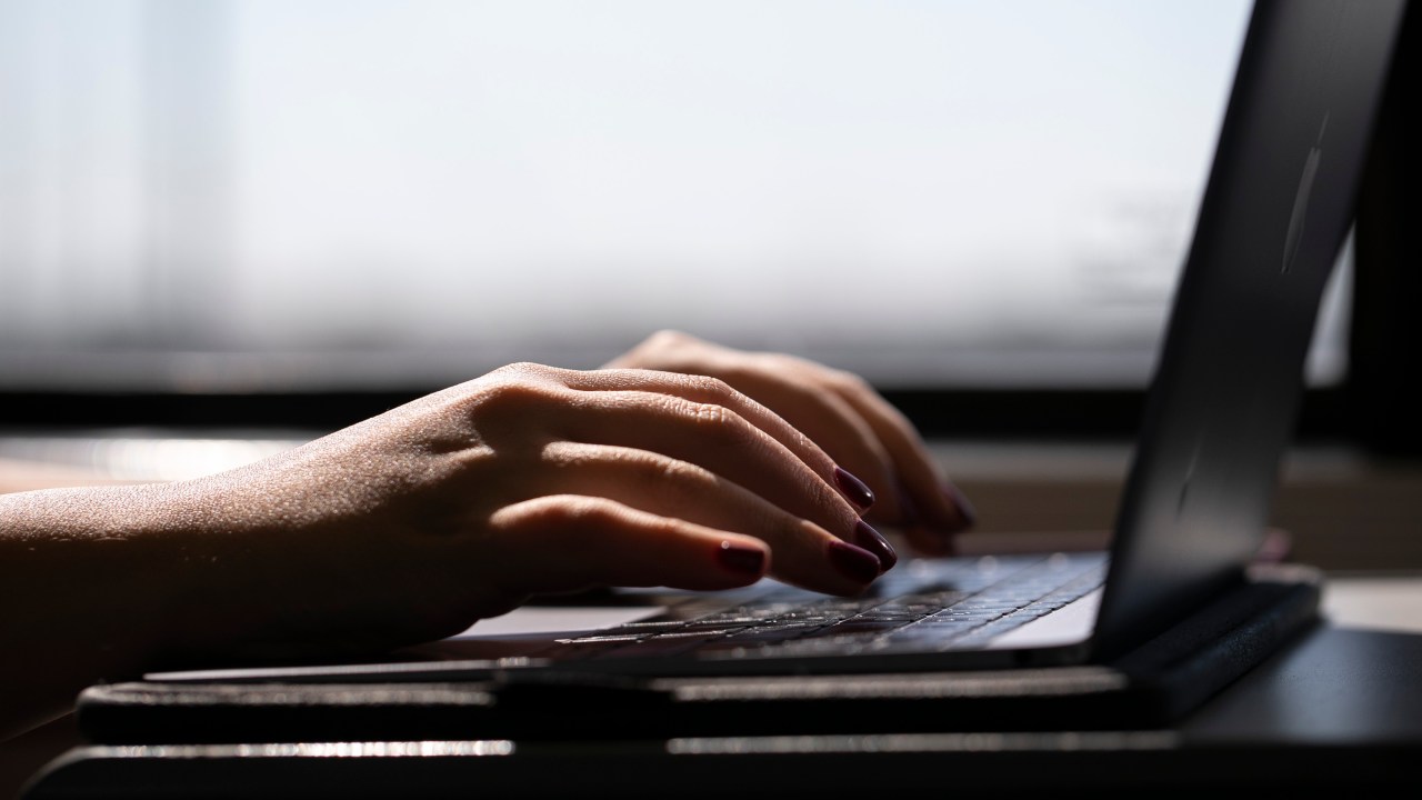 Woman on laptop.