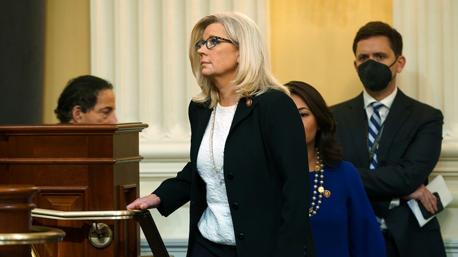 Rep. Liz Cheney (R-Wyo.) returns from a break during a House Jan. 6 committee hearing on Tuesday, July 12, 2022 focusing on the ties between former President Trump and far-right extremist groups.