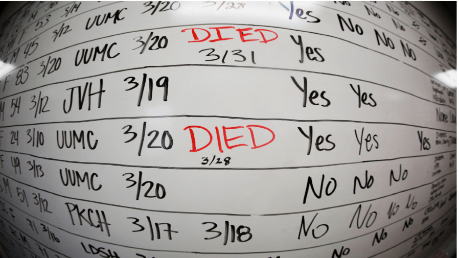 FILE - This May 13, 2020 photo made with a fisheye lens shows a list of the confirmed COVID-19 cases in Salt Lake County early in the coronavirus pandemic at the Salt Lake County Health Department, in Salt Lake City.