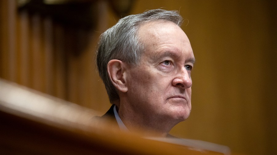 Sen. Mike Crapo (R-Idaho) listens during a hearing