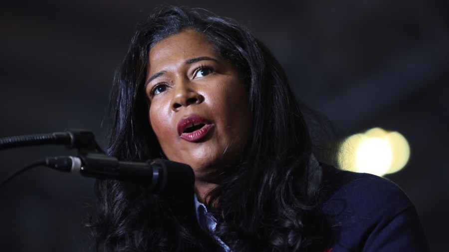 Kristina Karamo, who is running for Michigan secretary of state, speaks at an April 2022 rally hosted by former President Trump near Washington, Mich.