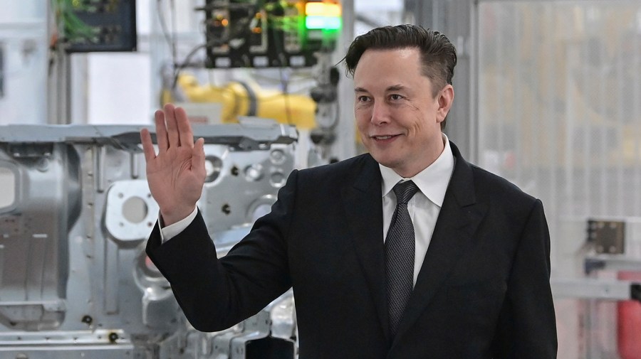 Tesla CEO Elon Musk attends the opening of a Tesla factory