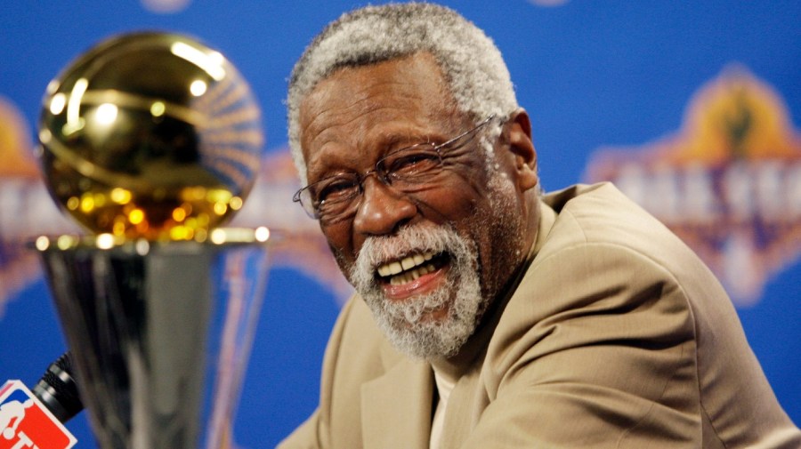 NBA great Bill Russell reacts at a as he learns the most valuable player award for the NBA basketball championships has been renamed the Bill Russell NBA Finals Most Valuable Player Award during a news conference Feb. 14, 2009 in Phoenix.