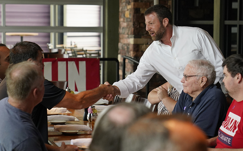 Rep. Markwayne Mullin (R-Okla.) speaks with supporters