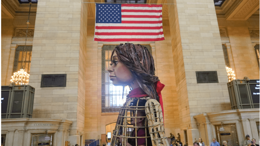 A large puppet named Little Amal walks around Grand Central Station in New York, Thursday, Sept. 15, 2022.