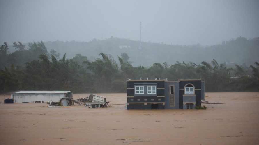 A home is submerged in floodwaters caused by Hurricane Fiona in Cayey, Puerto Rico