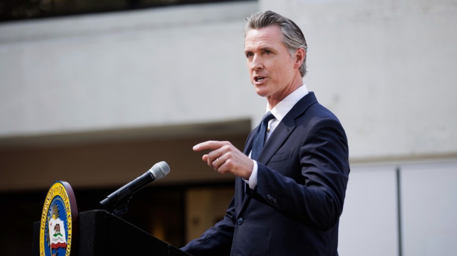 California Gov. Gavin Newsom speaks before signing legislation