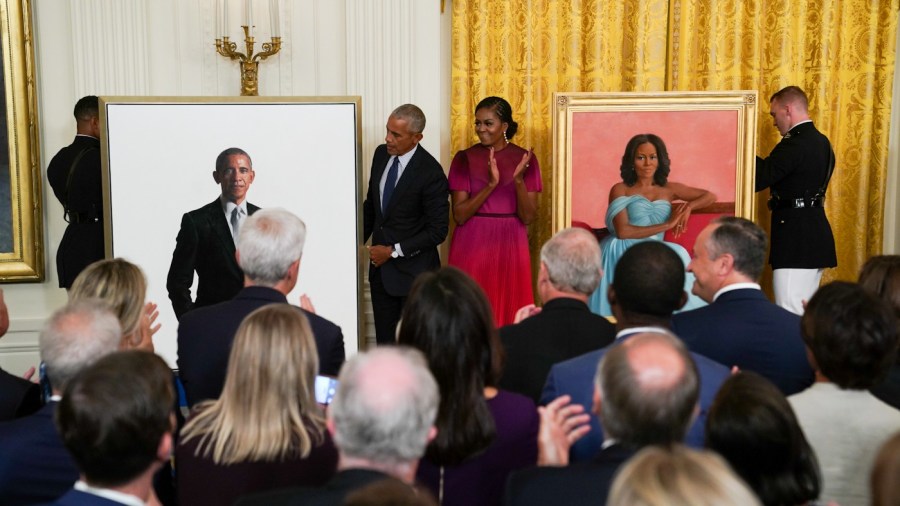 Former President Obama and former first lady Michelle Obama attend the unveiling of their portraits at the White House.