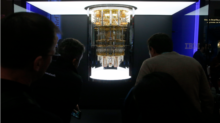 CES patrons take a look as IBM unveils this quantum computer, Q System One, shown here during the CES tech show Wednesday, Jan. 8, 2020, in Las Vegas.