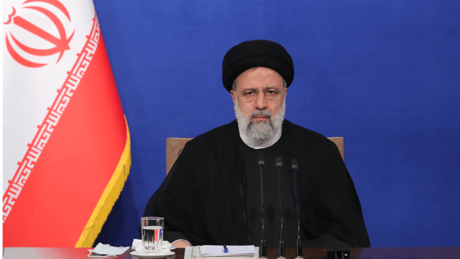 In this photo released by the official website of the office of the Iranian Presidency, President Ebrahim Raisi sits during his press conference in Tehran, Iran, Monday, Aug. 29, 2022.