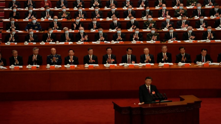 Delegates applaud as Chinese President Xi Jinping speaks during the opening ceremony of the 20th National Congress of China's ruling Communist Party held at the Great Hall of the People in Beijing, China, Sunday, Oct. 16, 2022.