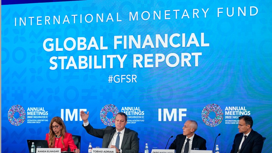 International Monetary Fund members speak at a news conference