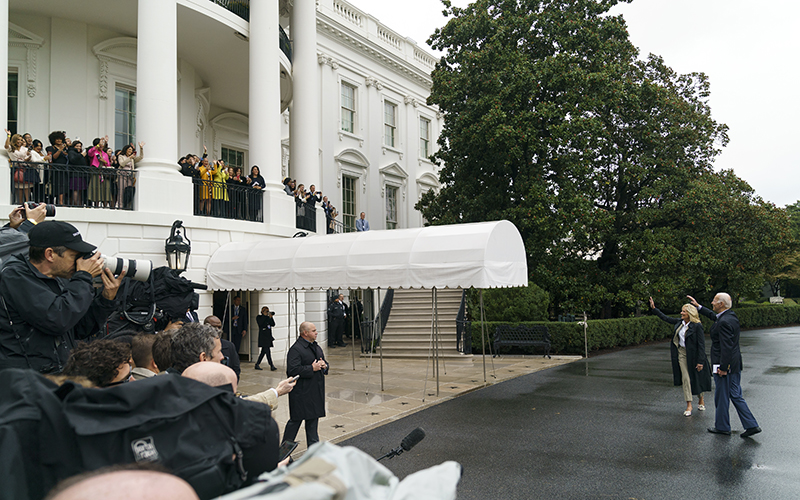 President Biden and first lady Jill Biden wave