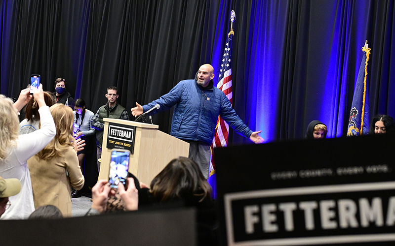 Pennsylvania Democratic Senate candidate John Fetterman gestures as he addresses supporters