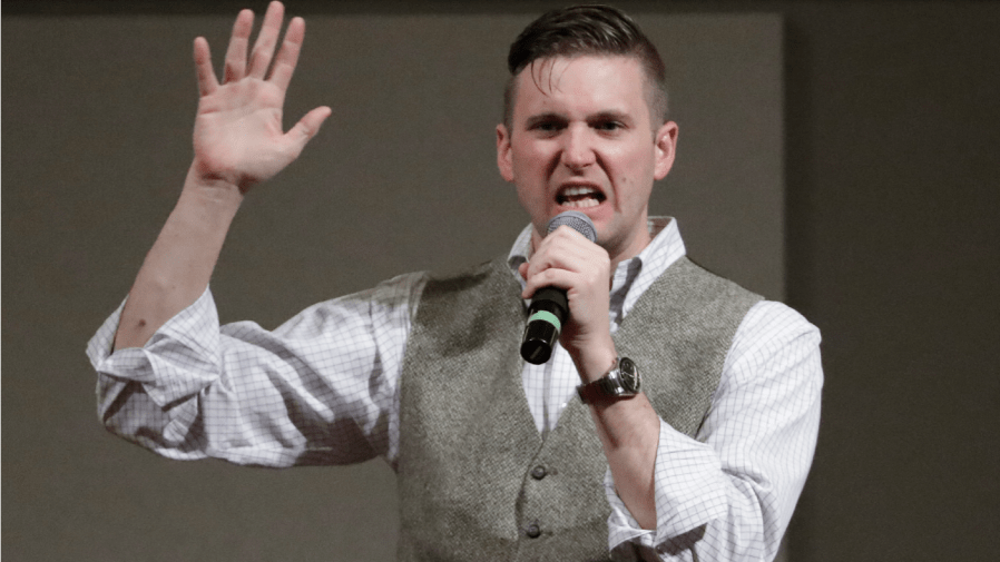 FILE - In this Dec. 6, 2016, file photo, Richard Spencer, who leads a movement that mixes racism, white nationalism and populism, speaks at the Texas A&M University campus in College Station, Texas.