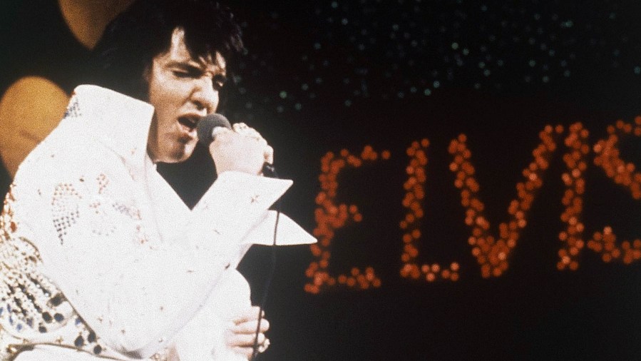 This 1972 photo shows Elvis Presley, the King of Rock 'n' Roll, during a performance. (AP Photo, file)