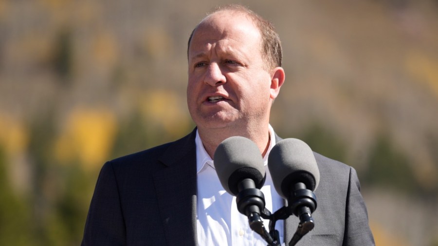 Colorado Governor Jared Polis speaks during an event.