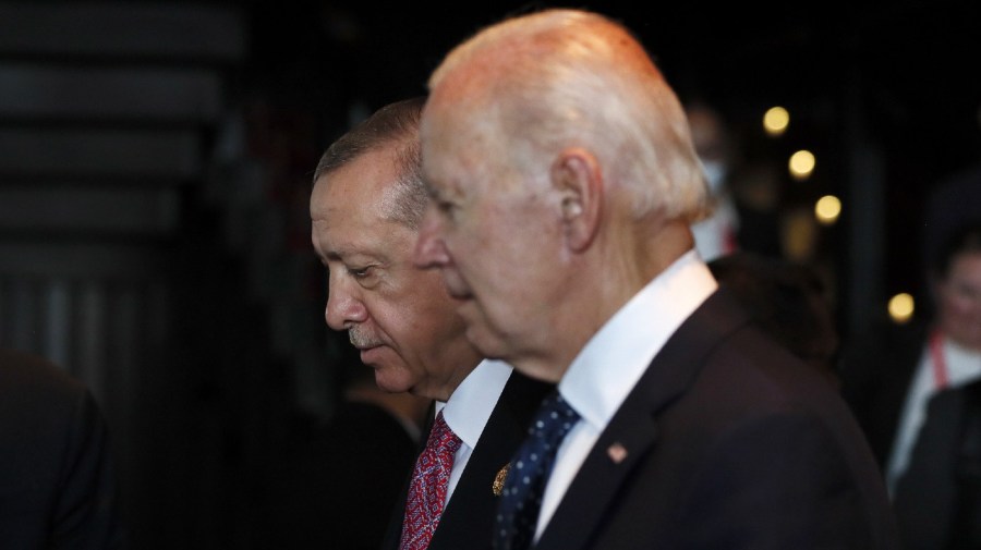 Turkish President Recep Tayyip Erdogan, left, walks with U.S. President Joe Biden during the G20 leaders' summit in Nusa Dua, Bali, Indonesia Tuesday, Nov. 15, 2022.