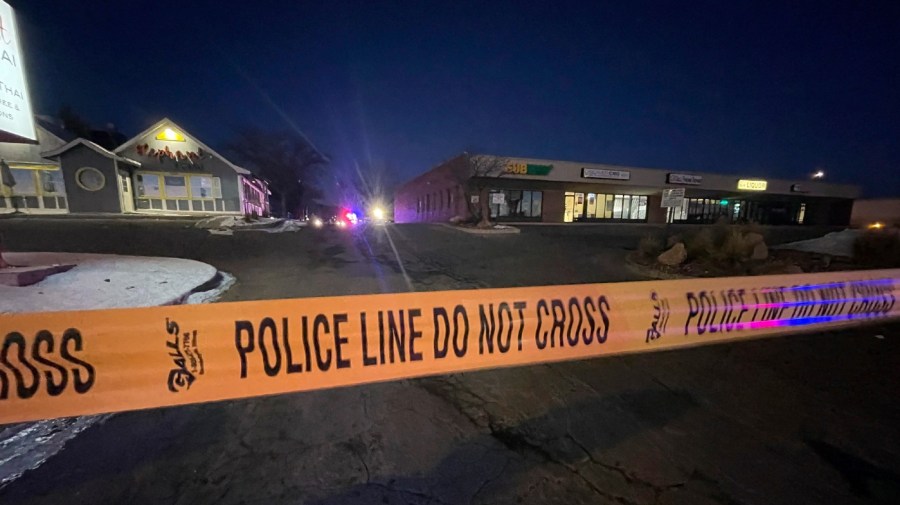 Crime tape is set up near a gay nightclub in Colorado Springs, Colo. where a shooting occurred late Saturday, Nov. 19, 2022.