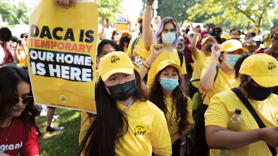 FILE - Susana Lujano, left, a dreamer from Mexico who lives in Houston, joins other activists to rally in support of the Deferred Action for Childhood Arrivals program, also known as DACA, at the U.S. Capitol in Washington on June 15, 2022.